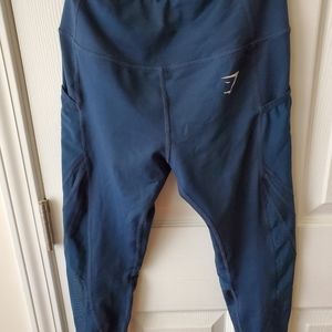 Gymshark cropped blue leggings with some mesh on leg